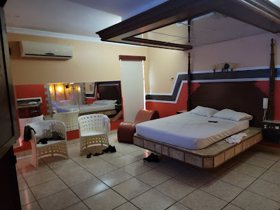 Caribbean Village Hotel & Suites